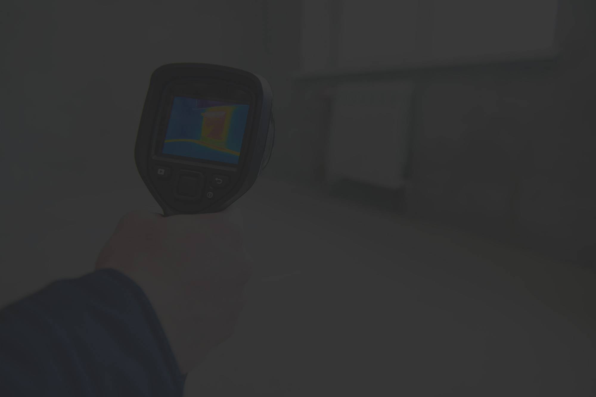 Plumber using leak detection equipment on residential pipework in Perth